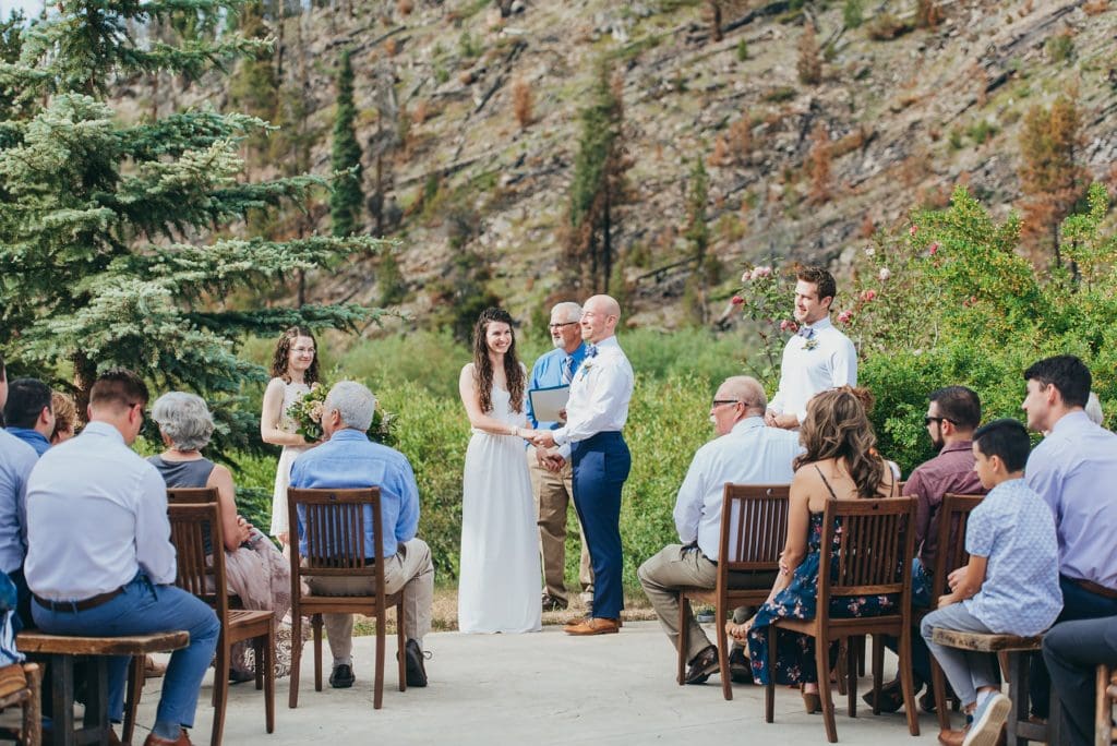 Happy couple at small outdoor wedding ceremony in Breckenridge, Colorado