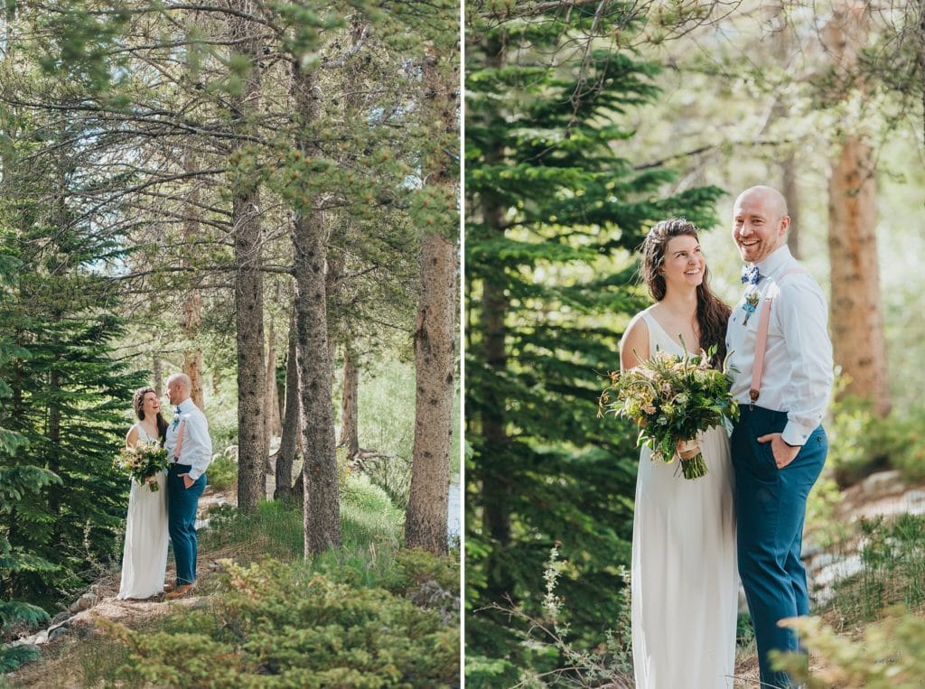Wedding couple laughs as they explore the woods in Breckenridge, Colorado