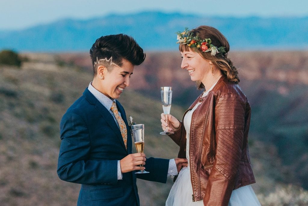 Couple toasts champagne after their elopement ceremony