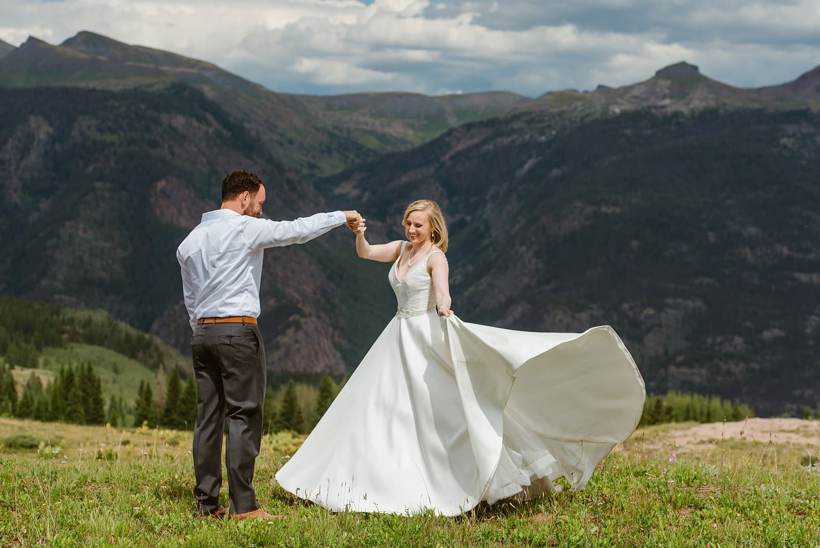 Elopement couple dances in Durango mountains